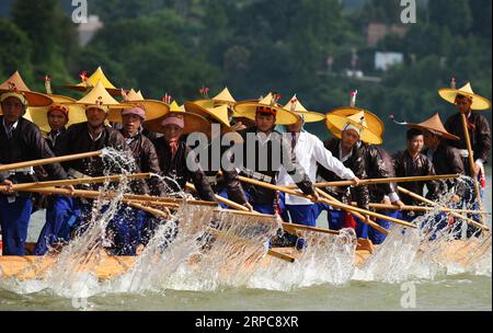 (190628) -- BEIJING, June 28, 2019 -- People of Miao ethnic group take part in a race during a dragon canoe festival in Shidong Town, Taijiang County, southwest China s Guizhou Province, June 27, 2019. ) XINHUA PHOTOS OF THE DAY YangxWenbin PUBLICATIONxNOTxINxCHN Stock Photo