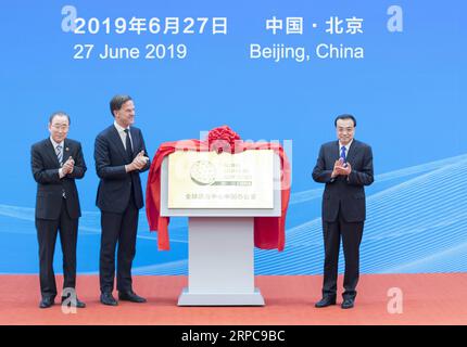 (190628) -- BEIJING, June 28, 2019 -- Chinese Premier Li Keqiang (R), Dutch Prime Minister Mark Rutte (C) and former UN Secretary-General Ban Ki-moon attend the inaugural ceremony of the Global Center on Adaptation China Office at the Great Hall of the People in Beijing, capital of China, June 27, 2019. ) CHINA-BEIJING-LI KEQIANG-CLIMATE CHANGE-GLOBAL CENTER ON ADAPTATION (CN) WangxYe PUBLICATIONxNOTxINxCHN Stock Photo
