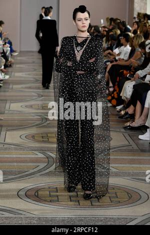 (190703) -- PARIS, July 3, 2019 (Xinhua) -- A model presents creations of Giorgio Armani Prive s Fall/Winter 2019/20 Haute Couture collections in Paris, France, July 2, 2019. (Xinhua/Piero Biasion) FRANCE-PARIS-FASHION WEEK-GIORGIO ARMANI PRIVE PUBLICATIONxNOTxINxCHN Stock Photo