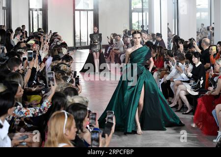 (190703) -- PARIS, July 3, 2019 (Xinhua) -- Models present creations from the Elie Saab s Fall/Winter 2019/20 Haute Couture collections in Paris, France, July 3, 2019. (Xinhua/Piero Biasion) FRANCE-PARIS-FASHION WEEK-ELIE SAAB PUBLICATIONxNOTxINxCHN Stock Photo