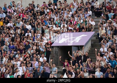 (190707) -- BEIJING, July 7, 2019 -- Families and friends of the graduates attend the 2019 commencement ceremony of Tsinghua University held in Beijing, capital of China, July 7, 2019. Over 3,000 graduates attended the ceremony on Sunday. ) CHINA-BEIJING-TSINGHUA UNIVERSITY-GRADUATION (CN) JuxHuanzong PUBLICATIONxNOTxINxCHN Stock Photo