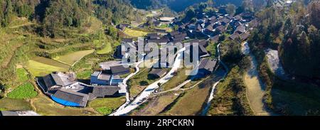 (190708) -- BEIJING, July 8, 2019 -- Aerial photo taken on Nov. 8, 2017 shows a residential dwelling cluster at Shibadong Village of Huayuan County, central China s Hunan Province. Located in central China, Hunan Province is well-known for its varied topography. It abuts the Dongting Lake to the north, and the east, south and west sides of the province are surrounded by mountains, with Wuling and Xuefeng Mountains to the west, Nanling Mountain to the south, Luoxiao and Mufu Mountains to the east. The Xiangjiang, Zijiang, Yuanjiang and Lishui Rivers converge on the Yangtze River at the Dongting Stock Photo