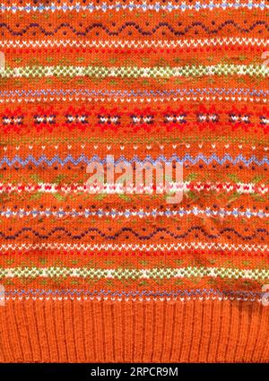 Pattern fabric made of wool. Handmade knitted fabric colored wool background texture Stock Photo
