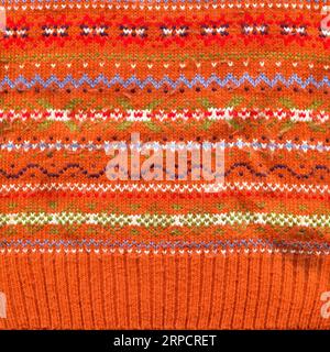 Pattern fabric made of wool. Handmade knitted fabric colored wool background texture Stock Photo