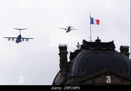 (190714) -- PARIS, July 14, 2019 -- French military aircrafts fly over the Pyramid of Louvre Museum during the annual Bastille Day military parade in Paris, France, on July 14, 2019. ) FRANCE-PARIS-BASTILLE DAY-PARADE GaoxJing PUBLICATIONxNOTxINxCHN Stock Photo