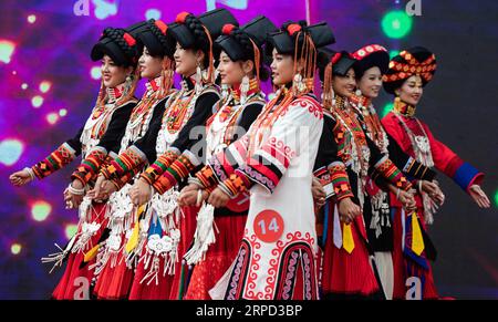 (190721) -- MEIGU, July 21, 2019 -- Women of Yi ethnic group pose on stage during a beauty pageant in Meigu County, southwest China s Sichuan Province, July 20, 2019. A beauty pageant of Yi ethnic group kicked off here on Saturday. A total of 28 contestants from Sichuan participated in clothing presentation and talent show during the pageant, which boasts a history of over 1,000 years. ) CHINA-SICHUAN-MEIGU-YI ETHNIC GROUP-BEAUTY PAGEANT (CN) JiangxHongjing PUBLICATIONxNOTxINxCHN Stock Photo