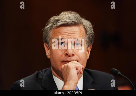 (190723) -- WASHINGTON, July 23, 2019 -- U.S. FBI Director Christopher Wray testifies before a Senate Judiciary Committee hearing on Oversight of the Federal Bureau of Investigation on Capitol Hill in Washington D.C., the United States, on July 23, 2019. ) U.S.-WASHINGTON D.C.-FBI-WRAY-HEARING LiuxJie PUBLICATIONxNOTxINxCHN Stock Photo