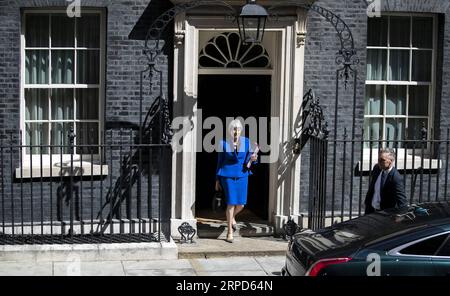 (190724) -- LONDON, July 24, 2019 -- British Prime Minister Theresa May leaves 10 Downing Street for her last Prime Minister s Questions at the House of Commons in London, Britain on July 24, 2019. ) BRITAIN-LONDON-THERESA MAY-PMQ HanxYan PUBLICATIONxNOTxINxCHN Stock Photo