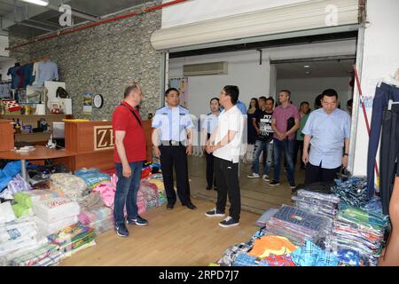 (190726) -- ZAGREB, July 26, 2019 -- Chinese police officers, making joint patrol with their Croatian colleagues, visit a trade center mainly selling Chinese goods in Zagreb, Croatia, July 25, 2019. Croatian and Chinese police officers started joint patrol for the second time in Croatia on July 13. Eight police officers from China s eastern Jiangsu Province patrolled with their Croatian colleagues in four groups in popular tourist destinations of Zagreb, Zadar, Dubrovnik and Plitvice Lakes National Park for a month. ) CROATIA-ZAGREB-CHINESE AND CROATIAN POLICE-JOINT PATROL GaoxLei PUBLICATIONx Stock Photo