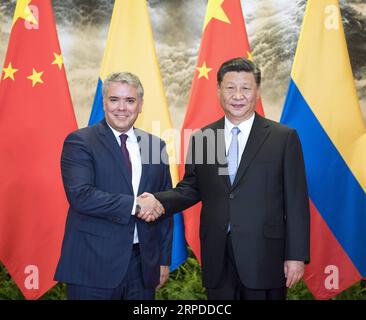 (190731) -- BEIJING, July 31, 2019 -- Chinese President Xi Jinping (R) holds talks with visiting Colombian President Ivan Duque Marquez at the Great Hall of the People in Beijing, capital of China, July 31, 2019. ) CHINA-BEIJING-XI JINPING-COLOMBIAN PRESIDENT-TALKS (CN) LixXueren PUBLICATIONxNOTxINxCHN Stock Photo