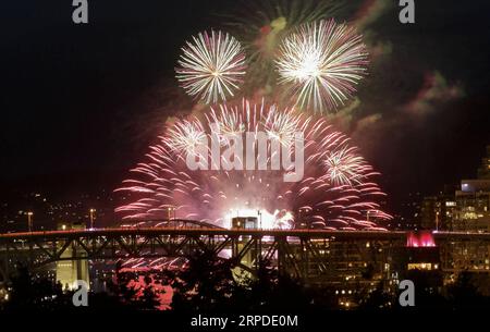 (190801) -- VANCOUVER, Aug. 1, 2019 (Xinhua) -- Team Canada lights up the sky during the Celebration of Light at English Bay in Vancouver, Canada, July 31, 2019. Team Canada lighted up the night sky with fireworks as part of the annual Honda Celebration of Light, which attracted hundred of thousands people to attend. (Photo by Liang Sen/Xinhua) CANADA-VANCOUVER-CELEBRATION OF LIGHT-FIREWORKS-TEAM CANADA PUBLICATIONxNOTxINxCHN Stock Photo