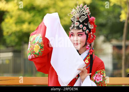 Luannan County, China - June 26, 2019: Peking Opera performers rehearse in the park, Luannan County, Hebei Province, China Stock Photo