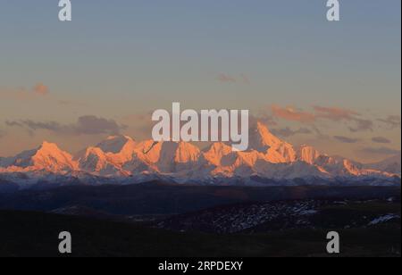 (190802) -- BEIJING, Aug. 2, 2019 -- Photo taken on Nov. 9, 2018 shows the view of Gonggar Mountain in southwest China s Sichuan Province. Located in southwestern China, Sichuan is a landlocked province boasting various biological resources and landscapes. Sichuan is often dubbed as giant panda capital of the world, as more than 70% wild pandas live in the province. To bring the species back from the brink of extinction, relevant authorities have been implementing measures to protect and restore habitats, as well as expand and build nature reserves and breeding bases, in a race to save the bea Stock Photo