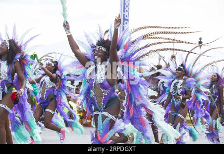 (190804) -- TORONTO, Aug. 4, 2019 -- Dressed up revellers take part in the 2019 Toronto Caribbean Carnival Grand Parade in Toronto, Canada, Aug. 3, 2019. People from near and far converged on the street for the annual Caribbean Carnival Grand Parade here on Saturday. ) CANADA-TORONTO-CARIBBEAN CARNIVAL GRAND PARADE ZouxZheng PUBLICATIONxNOTxINxCHN Stock Photo