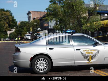(190804) -- DAYTON (U.S.), Aug. 4, 2019 -- A police car is seen near the scene of mass shooting in Dayton of Ohio, the United States, on Aug. 4, 2019. Local police on Sunday identified the suspect of a shooting spree in the city of Dayton, U.S. state of Ohio, as Connor Betts, a 24-year-old white male. In a press conference, Dayton Mayor Nan Whaley said it took less than a minute for the shooter to claim the lives of nine people, including Betts 22-year-old sister Megan Betts, before being killed by the police. ) U.S.-OHIO-DAYTON-MASS SHOOTING-AFTERMATH LiuxJie PUBLICATIONxNOTxINxCHN Stock Photo