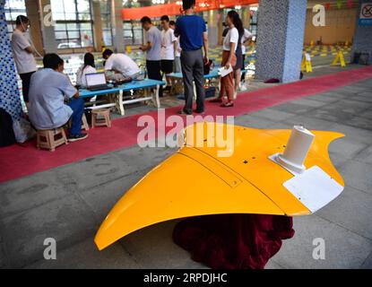 (190806) -- XI AN, Aug. 6, 2019 -- Photo taken on Aug. 3, 2019 shows the prototype of a biomimetic robot in the shape of a manta ray in Xi an, northwest China s Shaanxi Province. Chinese researchers in Northwestern Polytechnical University have developed a biomimetic robot in the shape of a manta ray, or devilfish, that can flap its wings and slide underwater. As one of the nature s most efficient swimmers, manta rays possess a unique propulsion mechanism with characteristics such as high propulsion efficiency, high mobility and stability, low noise and large load capacity. The researchers cre Stock Photo