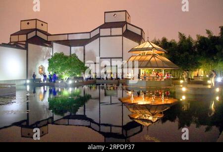 (190809) -- BEIJING, Aug. 9, 2019 -- Visitors are seen during a night event at Suzhou Museum in Suzhou, east China s Jiangsu Province, May 18, 2019. Nighttime economy has become a hot word this summer. It refers to business activities between 6 p.m. and 6 a.m. in the service sector. Many Chinese cities, especially metropolises such as Beijing, Shanghai and Guangzhou, have rolled out plans to support nighttime consumption to drive economic growth. China s GDP grew by 6.3 percent in the first half of this year, and consumption accounted for 60 percent, which continued to be the first driving for Stock Photo