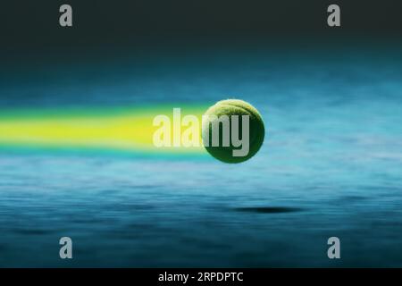 A tennis ball flying through the air at high speed, leaving a trail ...