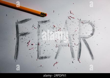 overcome fear concept Stock Photo
