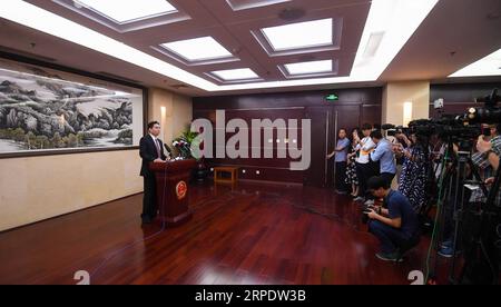 (190812) -- BEIJING, Aug. 12, 2019 -- Yang Guang (L), spokesperson for the Hong Kong and Macao Affairs Office of the State Council, remarks on Hong Kong rioters petrol bomb attacks on police in Beijing, Aug. 12, 2019. Yang on Monday strongly condemned the acts of a very small number of rioters in Hong Kong who on Sunday hurled petrol bombs at the police, causing injuries. We express extreme anger and strong condemnation against such atrocious and reckless acts of severe crime, Yang said. ) CHINA-BEIJING-STATE COUNCIL-HONG KONG-RIOT-CONDEMNATION (CN) ChenxYehua PUBLICATIONxNOTxINxCHN Stock Photo