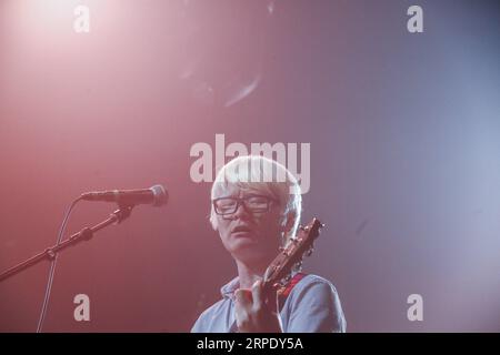 (190815) -- BEIJING, Aug. 15, 2019 -- A member of the band 8772 performs during the launching ceremony of the band s first album in Beijing, capital of China, Aug. 14, 2019. After three-year efforts, the band 8772 released their first album titled Never Rare featuring ten original songs in Beijing Wednesday. An audience of about 300 attended the launching ceremony and watched performances staged by the band. Most members of the band suffer rare diseases including brittle bone diseases, Kallmann Syndrome and spinal muscular atrophy. The band is named 8772 as it resembles the letters BTTZ, the i Stock Photo
