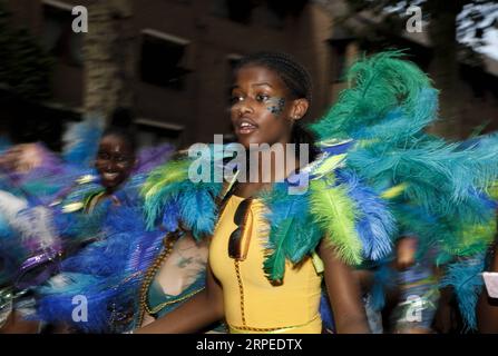 (190826) -- LONDON, Aug. 26, 2019 -- Performers participate in the 2019 Notting Hill Carnival Family Day in London, Britain on Aug. 25, 2019. Originated in the 1960s, the carnival is a way for Afro-Caribbean communities to celebrate their cultures and traditions. ) BRITAIN-LONDON-NOTTING HILL CARNIVAL-FAMILY DAY HanxYan PUBLICATIONxNOTxINxCHN Stock Photo