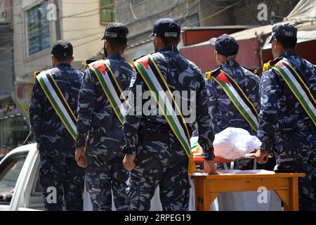 (190828) -- GAZA, Aug. 28, 2019 -- Palestinian policemen attend the funeral of security officers in Gaza City, Aug. 28, 2019. Three security officers were killed and two others wounded in two bomb attacks on two police checkpoints west of Gaza, on Tuesday night. (Str/Xinhua) MIDEAST-GAZA-SECURITY OFFICERS-FUNERAL guoyu PUBLICATIONxNOTxINxCHN Stock Photo