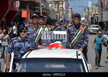 (190828) -- GAZA, Aug. 28, 2019 -- Palestinian policemen attend the funeral of security officers in Gaza City, Aug. 28, 2019. Three security officers were killed and two others wounded in two bomb attacks on two police checkpoints west of Gaza, on Tuesday night. (Str/Xinhua) MIDEAST-GAZA-SECURITY OFFICERS-FUNERAL guoyu PUBLICATIONxNOTxINxCHN Stock Photo