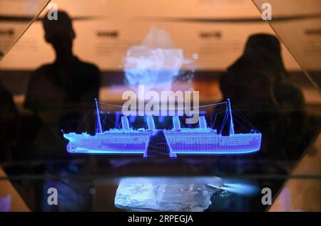 China, Filmmuseum in Qingdao (190829) -- QINGDAO, Aug. 29, 2019 -- People look at the digital model holographic demonstration of Titanic at the Qingdao Film Museum in Qingdao, east China s Shandong Province, Aug. 28, 2019. ) CHINA-SHANDONG-QINGDAO-FILM MUSEUM (CN) LixZiheng PUBLICATIONxNOTxINxCHN Stock Photo