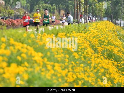 (190905) -- BEIJING, Sept. 5, 2019 -- People compete in a half marathon held in Feixian County, east China s Shandong Province, May 12, 2019. Rural revitalization strategy was first put forward during the 19th National Congress of the Communist Party of China in 2017 and repeatedly stressed by the Chinese leadership since then. The strategy s overall goal is to build rural areas with thriving businesses, pleasant living environments, social etiquette and civility, effective governance, and prosperity. ) CHINA-RURAL DEVELOPMENT (CN) ZhuxZheng PUBLICATIONxNOTxINxCHN Stock Photo