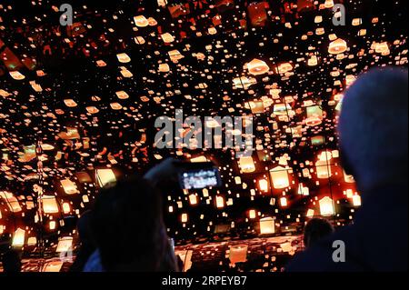 190907 -- BEIJING, Sept. 7, 2019 -- Visitors watch OLED television during the 2019 IFA fair in Berlin, capital of Germany, Sept. 6, 2019. The 59th Consumer Electronics Unlimited IFA fair, Europe s biggest consumer electronics show, opened in Berlin on Friday, with the latest products and innovations from the leading global brands.  XINHUA PHOTOS OF THE DAY ShanxYuqi PUBLICATIONxNOTxINxCHN Stock Photo