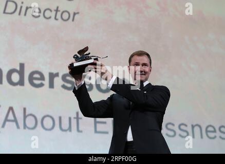 (190908) -- VENICE, Sept. 8, 2019 -- Producer Johan Carlsson receives the Silver Lion for Best Director on behalf of Swedish director Roy Andersson at the 76th Venice International Film Festival, for the movie About Endlessness , in Venice, Italy, Sept. 7, 2019. The 76th Venice Film Festival has run from Aug. 28 to Sept. 7 at the Lido of the Italian lagoon city, with 21 films in competition. ) ITALY-VENICE-FILM FESTIVAL-AWARD CEREMONY ChengxTingting PUBLICATIONxNOTxINxCHN Stock Photo