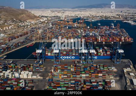 (190908) -- BEIJING, Sept. 8, 2019 (Xinhua) -- Aerial photo taken on Sept. 6, 2019 shows a cargo ship of COSCO SHIPPING Lines transporting Italian products to participate in the 2019 China International Import Expo (CIIE) to Shanghai, where the CIIE will be held, berths at the Port of Piraeus, Greece. (Photo by Lefteris Partsalis/Xinhua) XINHUA PHOTOS OF THE DAY PUBLICATIONxNOTxINxCHN Stock Photo