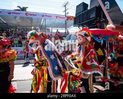 Barranquilla, Colombia - February 21 2023: Colombian Men Dressed in the Traditional Costumes of the Coast of the Country are Parading in the Famous Ba Stock Photo