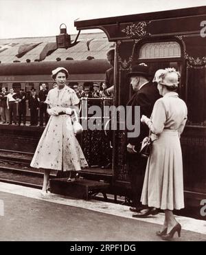 Queen Elizabeth II stepping off the Royal Train in 1954 during her Royal Visit to New South Wales. Stock Photo