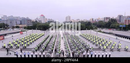 (190912) -- BEIJING, Sept. 12, 2019 -- Traffic police attend a launching ceremony at the Yongdingmen square in Beijing, capital of China, Sept. 12, 2019. The first batch of 185 traffic policemen began to patrol in the city on motorbikes on Thursday morning. ) CHINA-BEIJING-TRAFFIC POLICE ON MOTORBIKES (CN) YinxGang PUBLICATIONxNOTxINxCHN Stock Photo