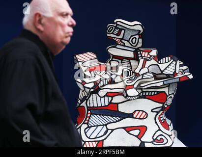 (190913) -- PARIS, Sept. 13, 2019 -- A man visits an exhibition preview of the La Biennale Paris 2019 at the Grand Palais in Paris, France, Sept. 12, 2019. The 31st edition of La Biennale Paris kicked off on Friday at the Grand Palais in Paris. This year s exhibition attracted over 70 exhibitors showing their pieces of antique furniture, jewelry, paintings, clocks, watches, etc. ) FRANCE-PARIS-LA BIENNALE PARIS GaoxJing PUBLICATIONxNOTxINxCHN Stock Photo