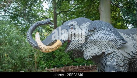 Zoo Planckendael, Mechelen, Belgium - Aug 29, 2023: Brick Safari and Animal Expo built with Lego bricks. Side view of African Elephant. Stock Photo