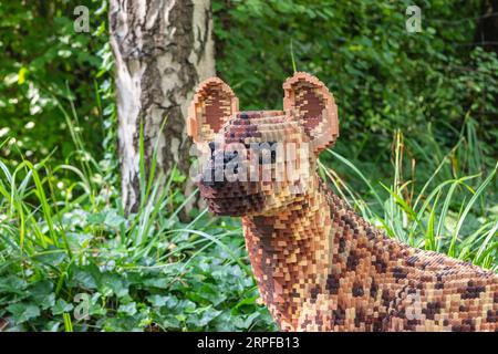 Zoo Planckendael, Mechelen, Belgium - Aug 29, 2023: Brick Safari and Animal Expo built with Lego bricks. Spotted Hyena. Stock Photo