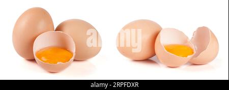 two whole eggs and broken egg isolated on white background Stock Photo