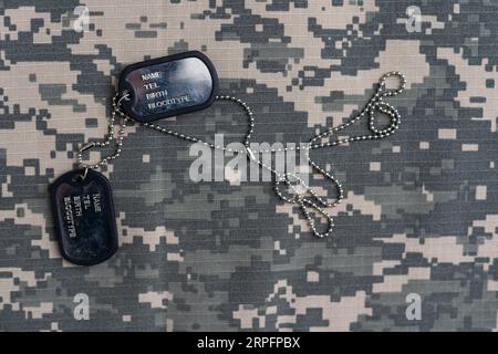 US military concept on olive green uniform background Stock Photo