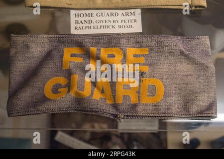 A 'Fire Guard' arm band from World War II on display in the Newhaven Museum, Newhaven, East Sussex, UK. Stock Photo