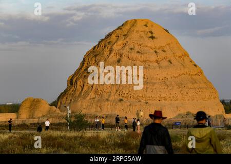 191002 -- YINCHUAN, Oct. 2, 2019 -- Tourists visit the imperial tombs dating back to the Western Xia Dynasty 1032-1227 in Yinchuan, capital of northwest China s Ningxia Hui Autonomous Region, Oct. 2, 2019, the second day of the 7-day-long National Day holiday.  CHINA-NATIONAL DAY-HOLIDAY CN FengxKaihua PUBLICATIONxNOTxINxCHN Stock Photo