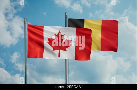 Belgium flag and Canada flag waving together on blue sky, two country cooperation concept Stock Photo