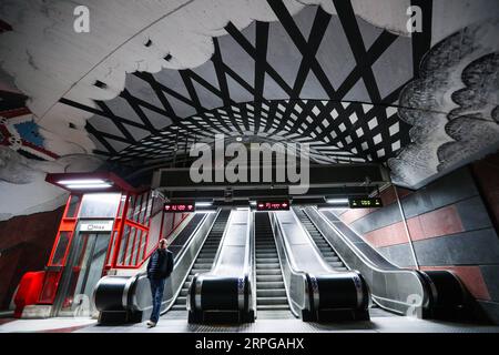 191010 -- STOCKHOLM, Oct. 10, 2019 -- A passenger walks in the Kungstradgard metro station in Stockholm, Sweden, Oct. 8, 2019. Till now, Stockholm s subway system consists of one hundred stations, each with unique art on its platform, walls or waiting hall. Since 1957, artists have been greatly involved in the building of new stations, and they also added beautiful statues, murals, and installations to the older stations.  SWEDEN-STOCKHOLM-TRANSPORTATION-METRO-ART ZhengxHuansong PUBLICATIONxNOTxINxCHN Stock Photo