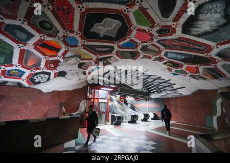 191010 -- STOCKHOLM, Oct. 10, 2019 -- Passengers walk in the Kungstradgard metro station in Stockholm, Sweden, Oct. 8, 2019. Till now, Stockholm s subway system consists of one hundred stations, each with unique art on its platform, walls or waiting hall. Since 1957, artists have been greatly involved in the building of new stations, and they also added beautiful statues, murals, and installations to the older stations.  SWEDEN-STOCKHOLM-TRANSPORTATION-METRO-ART ZhengxHuansong PUBLICATIONxNOTxINxCHN Stock Photo