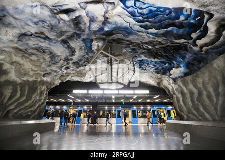 191010 -- STOCKHOLM, Oct. 10, 2019 -- Passengers walk in the Tekniska Hogskolan metro station in Stockholm, Sweden, Oct. 9, 2019. Till now, Stockholm s subway system consists of one hundred stations, each with unique art on its platform, walls or waiting hall. Since 1957, artists have been greatly involved in the building of new stations, and they also added beautiful statues, murals, and installations to the older stations.  SWEDEN-STOCKHOLM-TRANSPORTATION-METRO-ART ZhengxHuansong PUBLICATIONxNOTxINxCHN Stock Photo