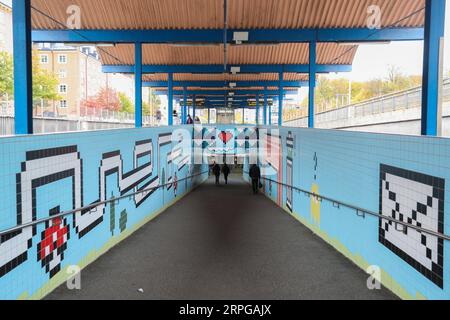 191010 -- STOCKHOLM, Oct. 10, 2019 -- Passengers walk in the Thorildsplan metro station in Stockholm, Sweden, Oct. 9, 2019. Till now, Stockholm s subway system consists of one hundred stations, each with unique art on its platform, walls or waiting hall. Since 1957, artists have been greatly involved in the building of new stations, and they also added beautiful statues, murals, and installations to the older stations.  SWEDEN-STOCKHOLM-TRANSPORTATION-METRO-ART ZhengxHuansong PUBLICATIONxNOTxINxCHN Stock Photo