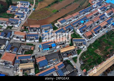 191013 -- JINCHENG, Oct. 13, 2019 -- Aerial photo taken on Oct. 13, 2019 shows photovoltaic power panels installed on roofs of residential houses in Hebei Village of Jincheng City, north China s Shanxi Province. As one of the poverty-alleviation measures, local government built photovoltaic power stations in 211 villages to help villagers increase their income with earning from the generated electricity.  CHINA-SHANXI-JINCHENG-PV POWER STATIONS CN CaoxYang PUBLICATIONxNOTxINxCHN Stock Photo