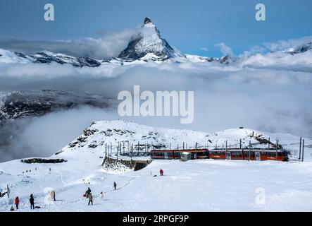 The Gornergrat Bahn Cogwheel Train Arriving At The Gornergrat Station